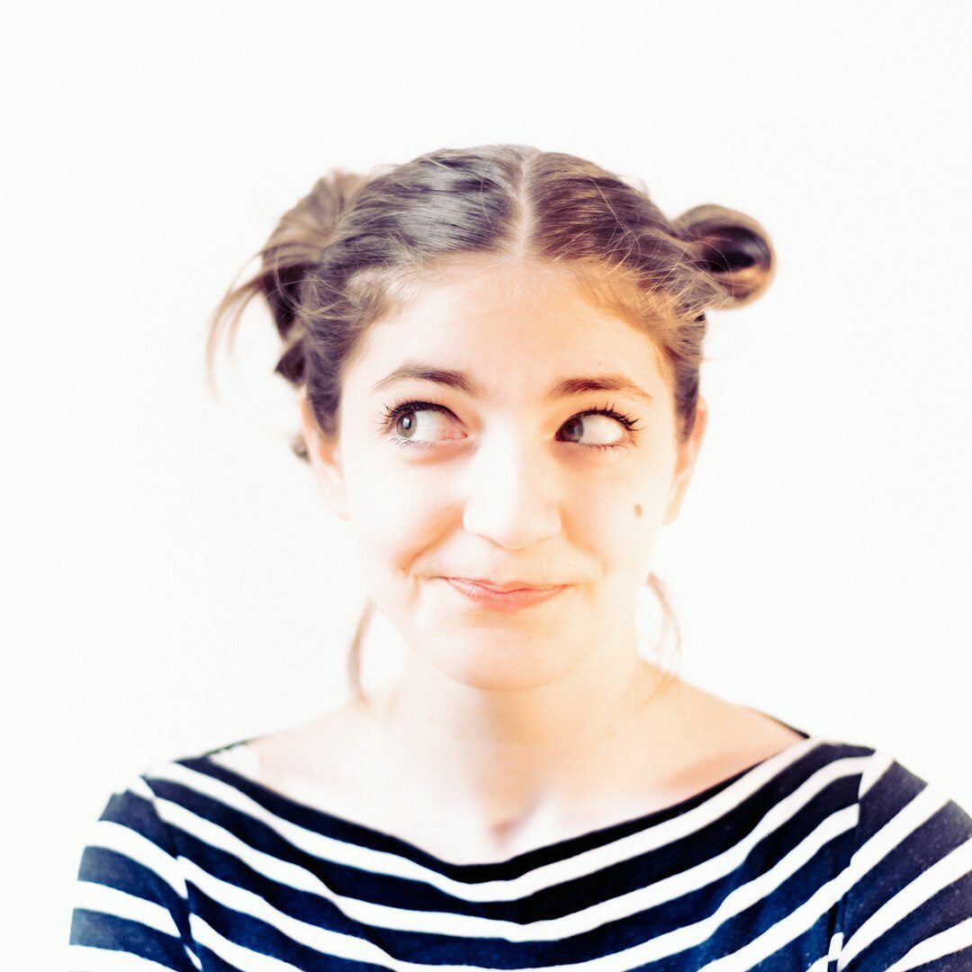 Studio portrait of a professional woman journalist smiling
